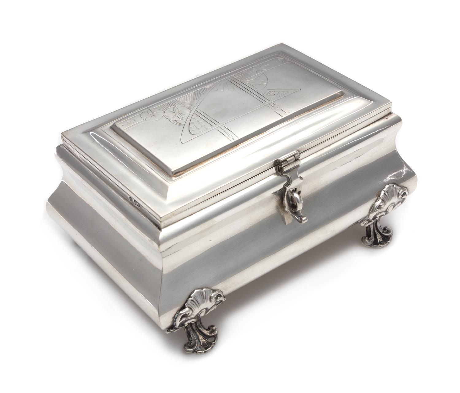 A Russian Silver Table Casket, Mark of Vasily Pulyatky, Moscow, Early 20th Century, the lid worked to show floral decoration, raised on