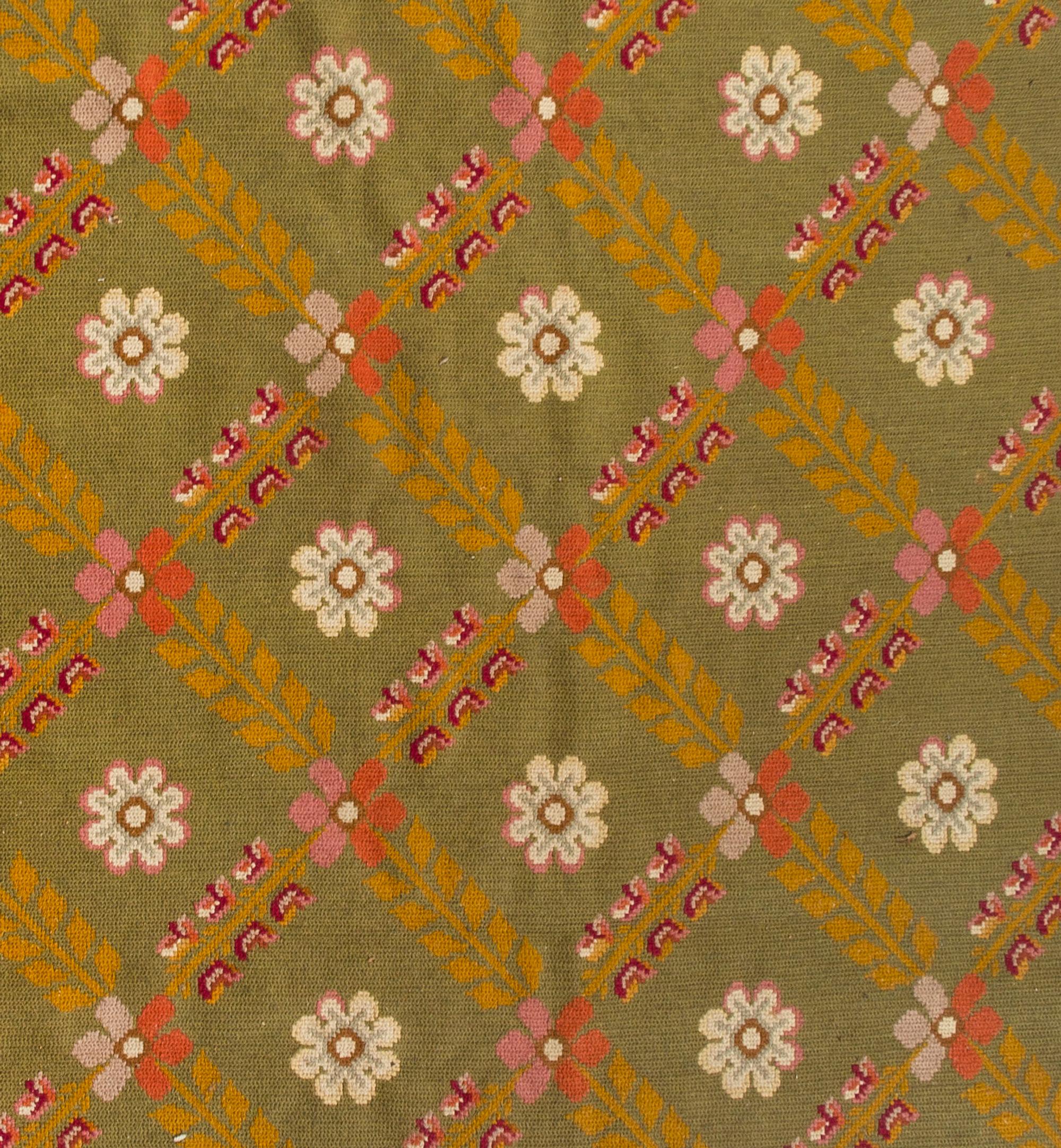 A Continental Needlepoint Rug