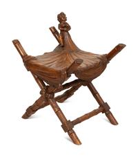 A Continental Carved Walnut X-form Stool