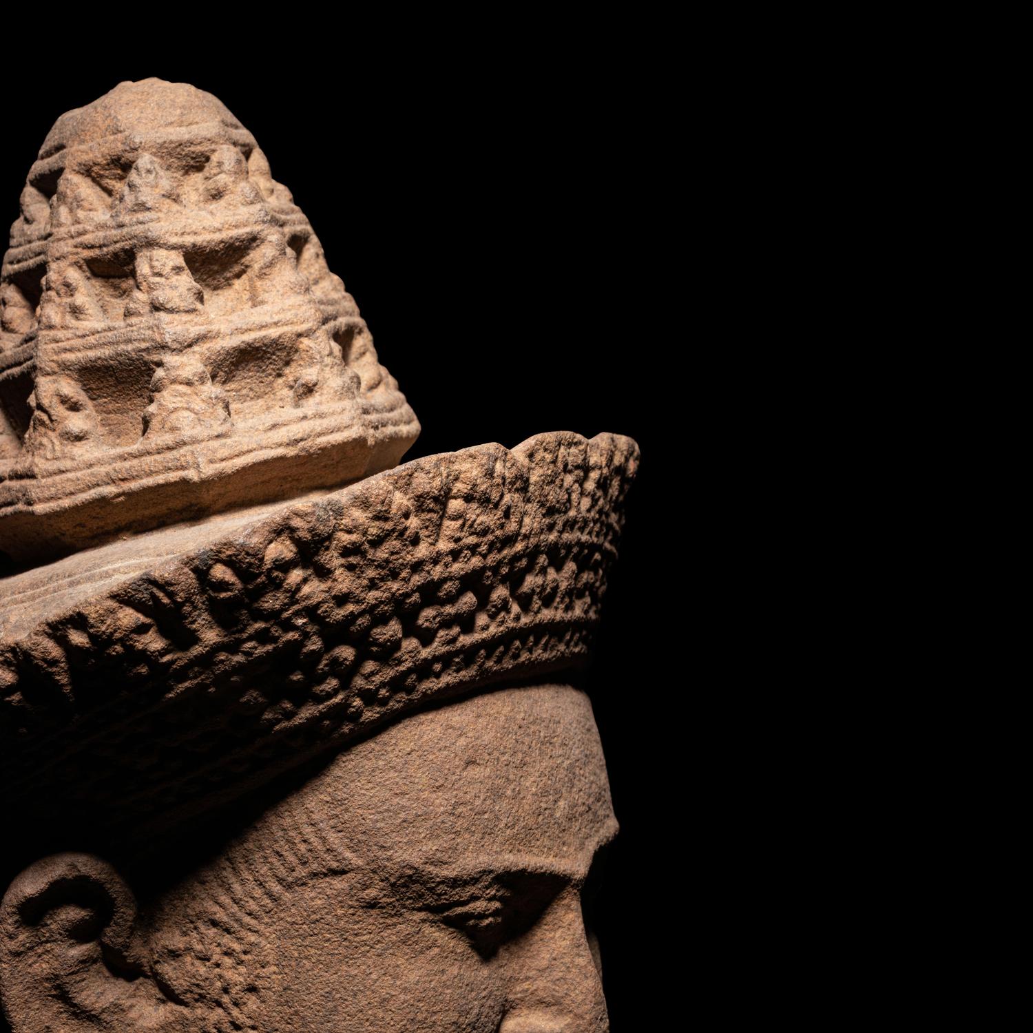 A Khmer Sandstone Head of a Male Divinity, Angkor Wat Style
