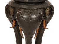 An Anglo-Indian Carved Ebonized Elephant Table