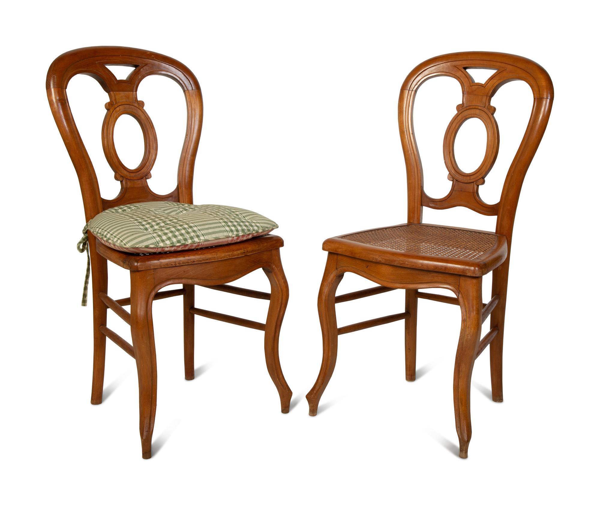 A French Provincial Style Fruitwood Dining Table and Six Side Chairs — 20TH CENTURY