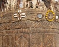 Primitive Mask with Feather and Fetishes