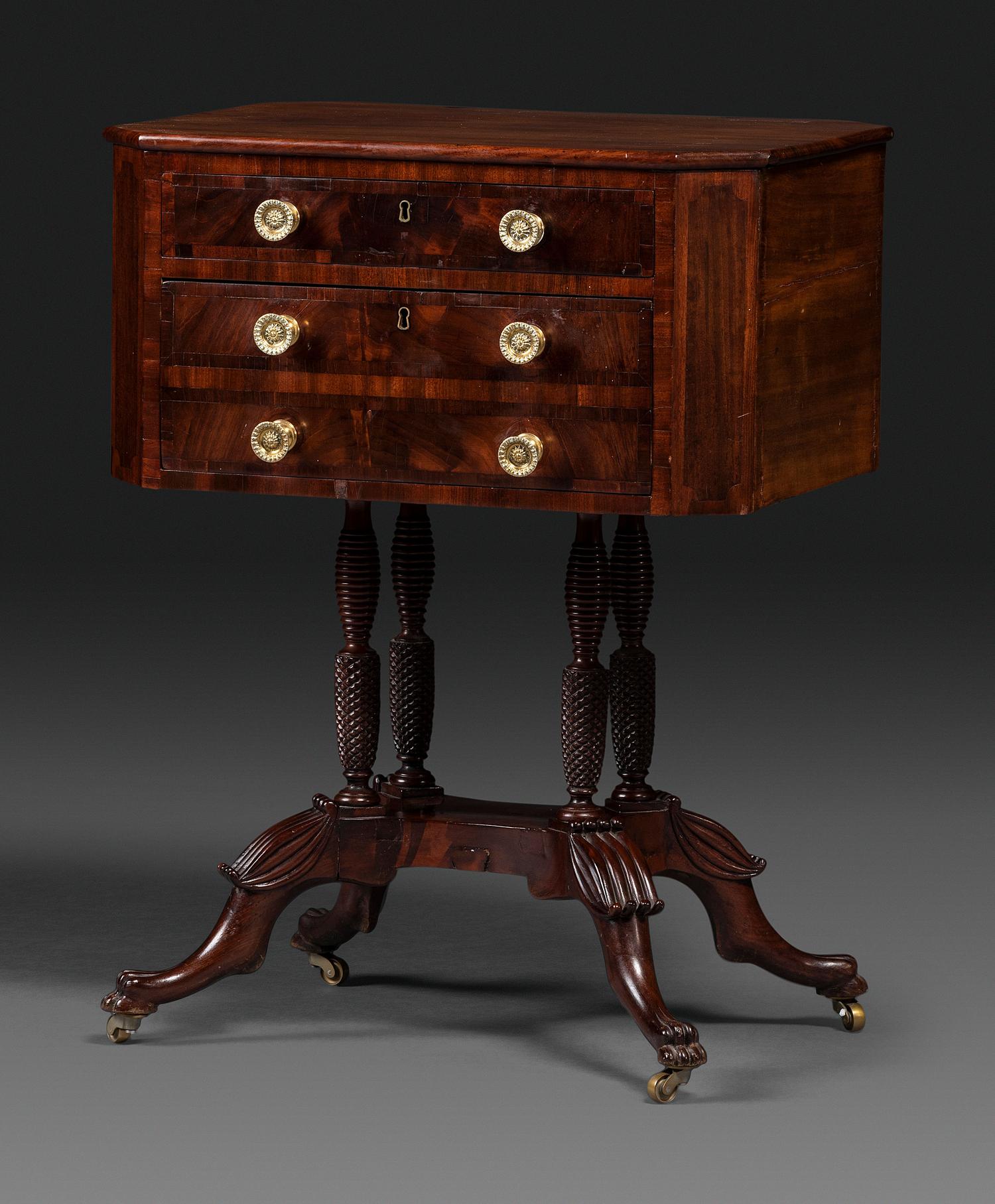 A Classical Figured Mahogany Two Drawer Claw-Foot Work Table