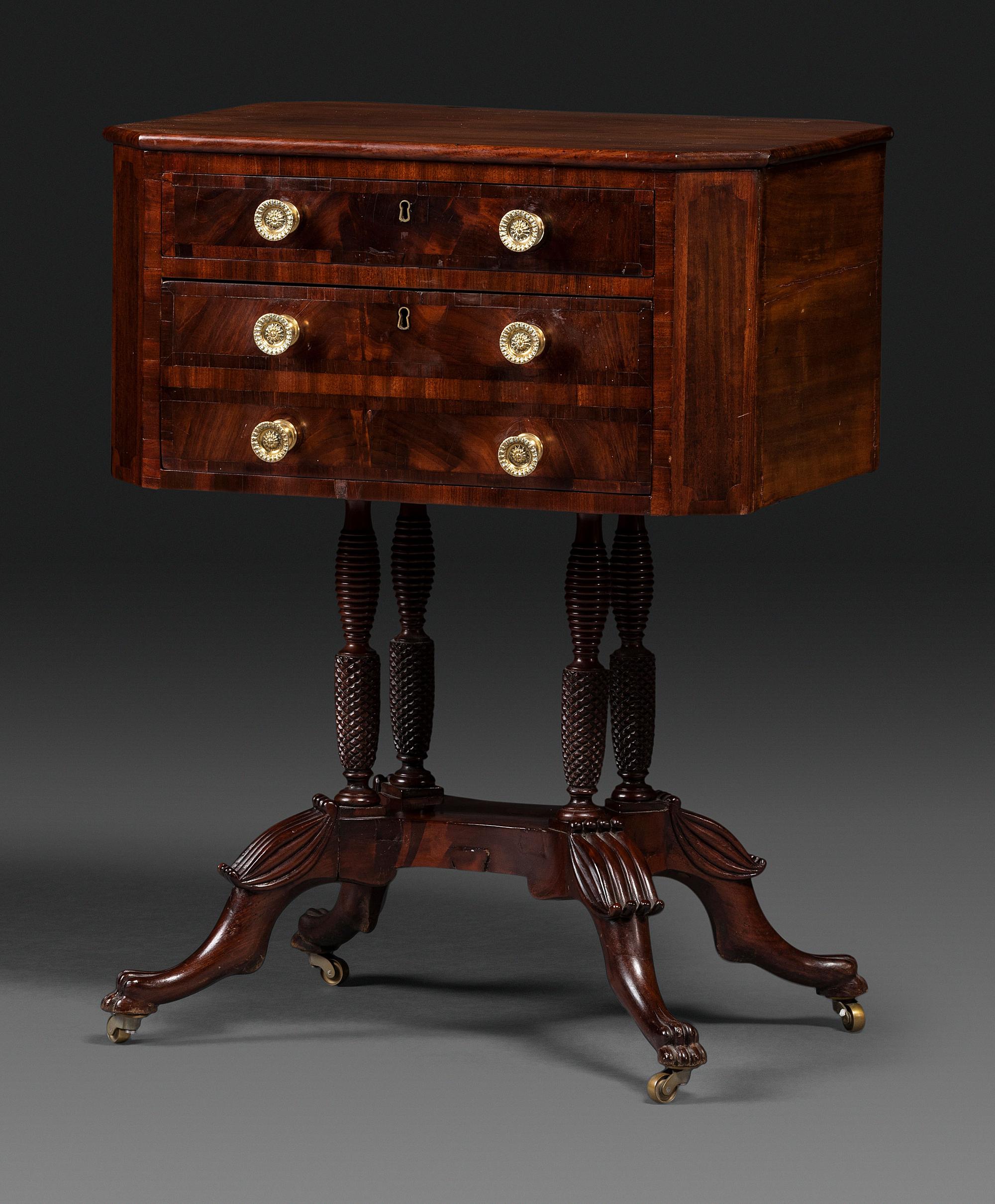 A Classical Figured Mahogany Two Drawer Claw-Foot Work Table