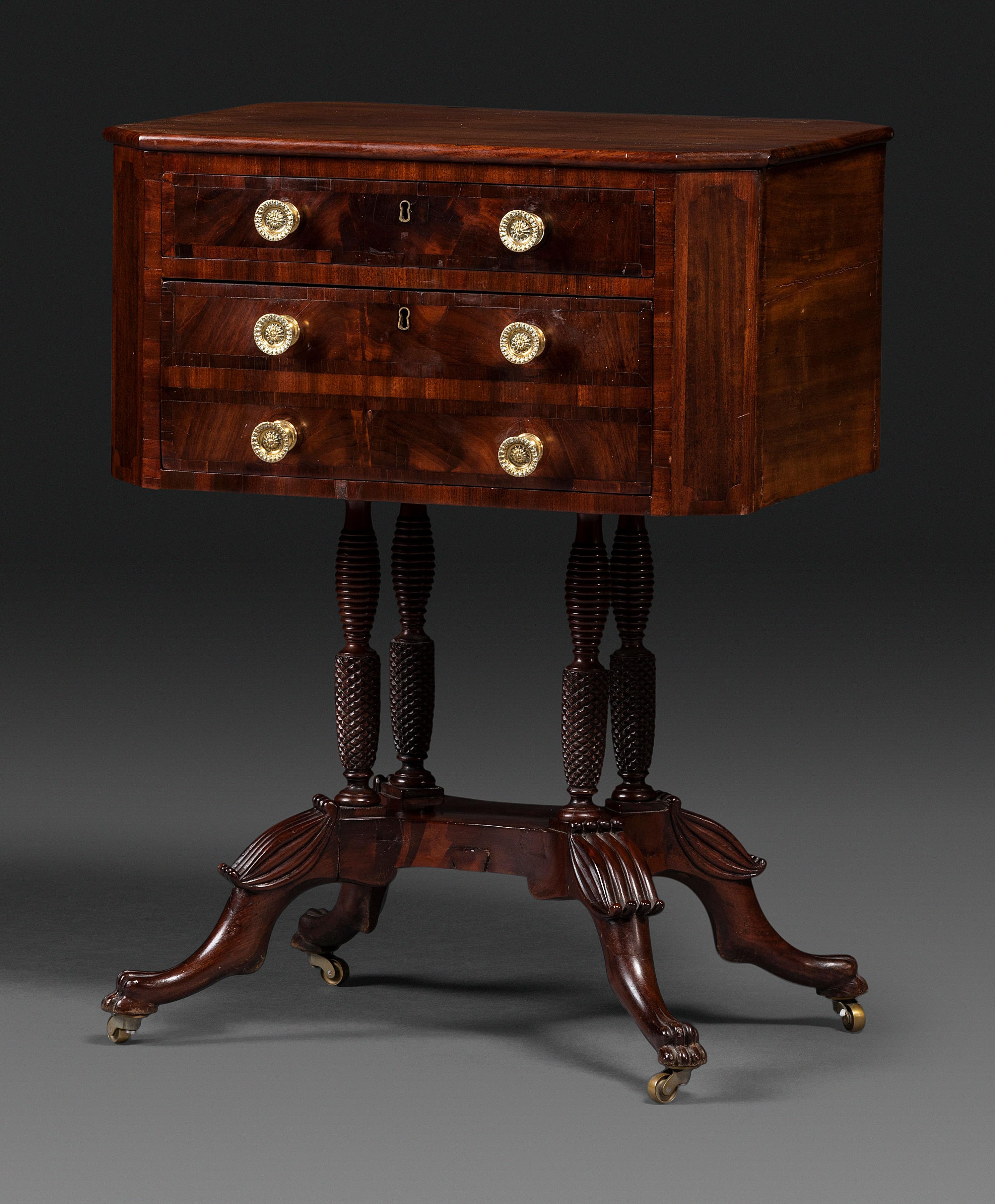 A Classical Figured Mahogany Two Drawer Claw-Foot Work Table