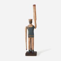 A carved and painted wood sailor whirligig