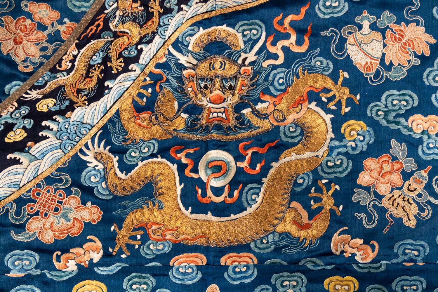 A Blue Ground Embroidered Silk Dragon Robe, Jifu