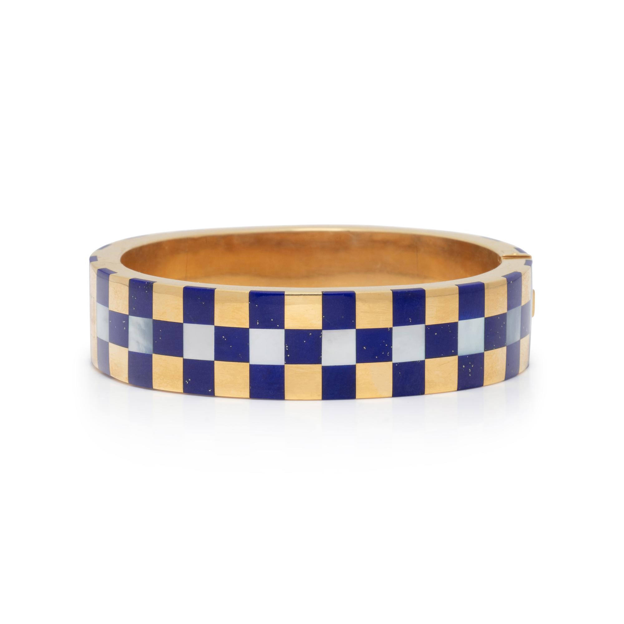 ANGELA CUMMINGS, TIFFANY & CO., MOTHER-OF-PEARL, LAPIS LAZULI, AND YELLOW GOLD BANGLE BRACELET