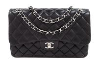 A Chanel Black Quilted Lambskin Jumbo Double Flap Bag, 8.25" H x 12" W x 3.5" D; Strap drop: 13.5"- 23.75".