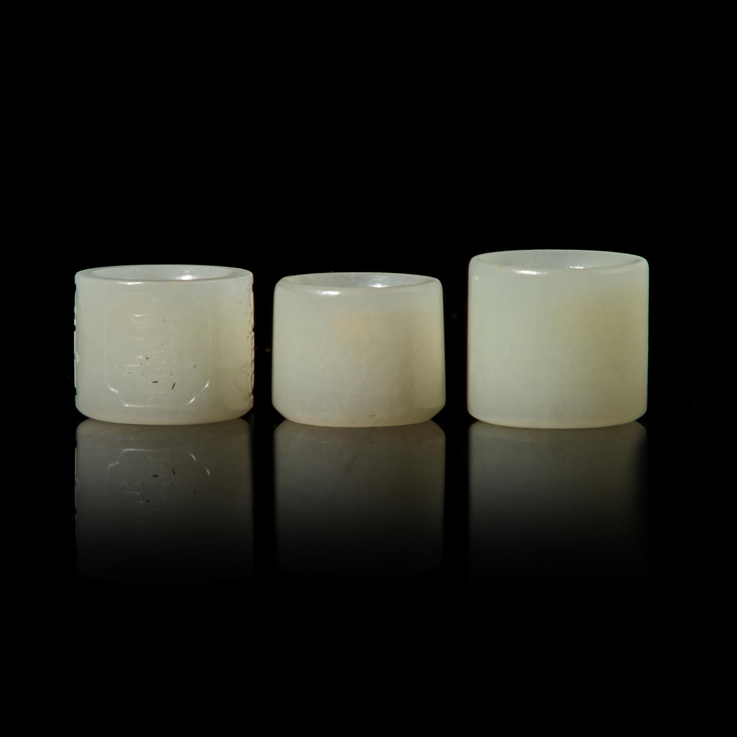 Three Chinese White Jade 'Double Happiness' Archer’s Rings, 19th Century 清晚期 白玉’雙喜‘扳指組三枚