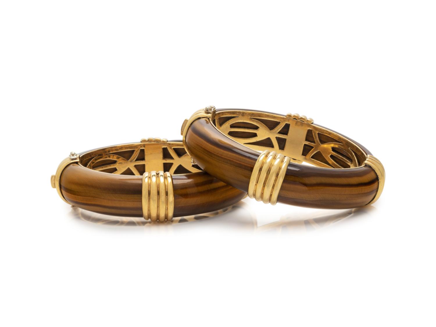 PAIR OF YELLOW GOLD AND TIGER'S EYE BANGLE BRACELETS