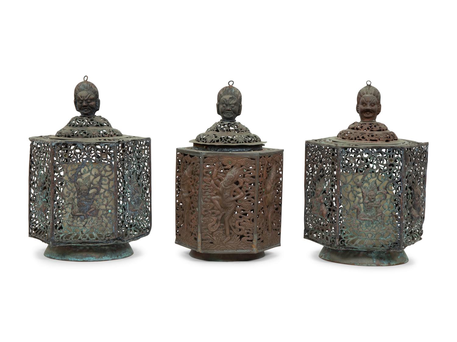 A Set of Three of Chinese Bronze Hanging Lanterns