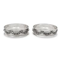 A Pair of Greek Silver Bottle Coasters