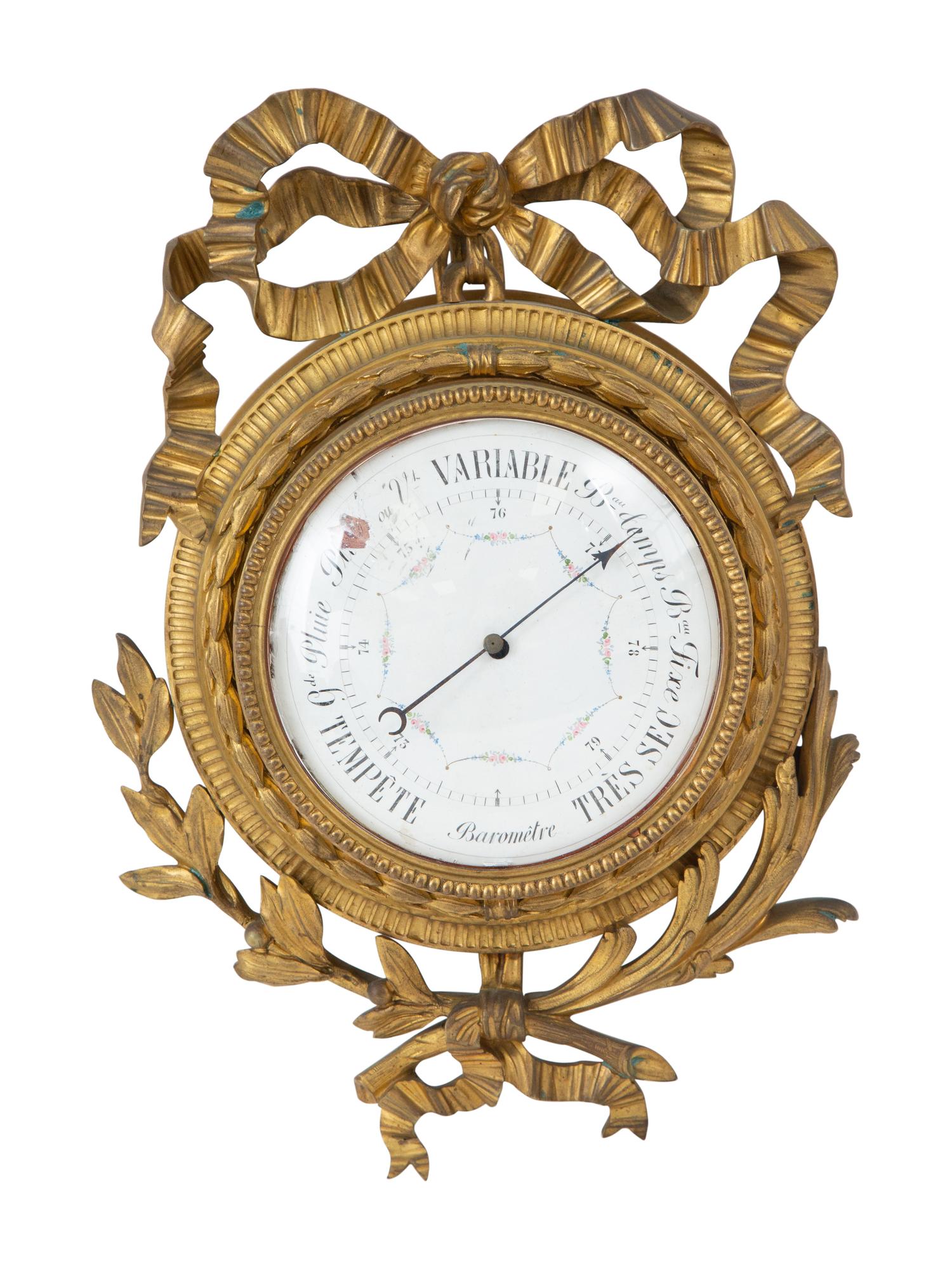 A Louis XVI Style Gilt Bronze Cartel Clock and Matching Barometer
