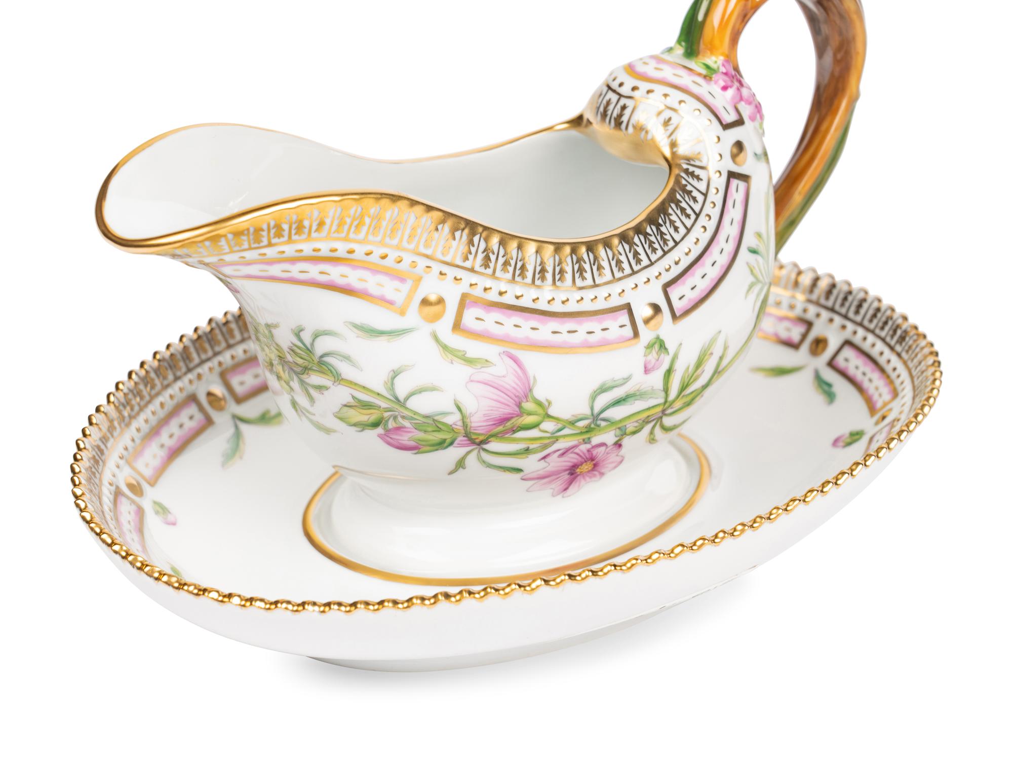 A Royal Copenhagen Flora Danica Porcelain Sauce Boat and Fixed Stand