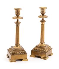 A Pair of Louis XVI Style Gilt Bronze Candlesticks Height 12 inches. — 19TH CENTURY