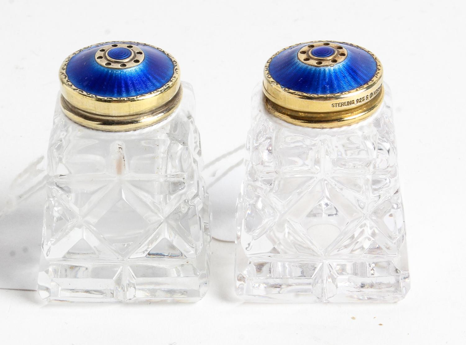 A Pair of Norwegian Enameled-Silver Mounted Cut Glass Casters Height 1 1/2 inches.