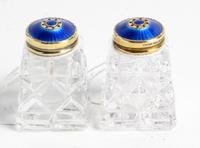 A Pair of Norwegian Enameled-Silver Mounted Cut Glass Casters Height 1 1/2 inches.