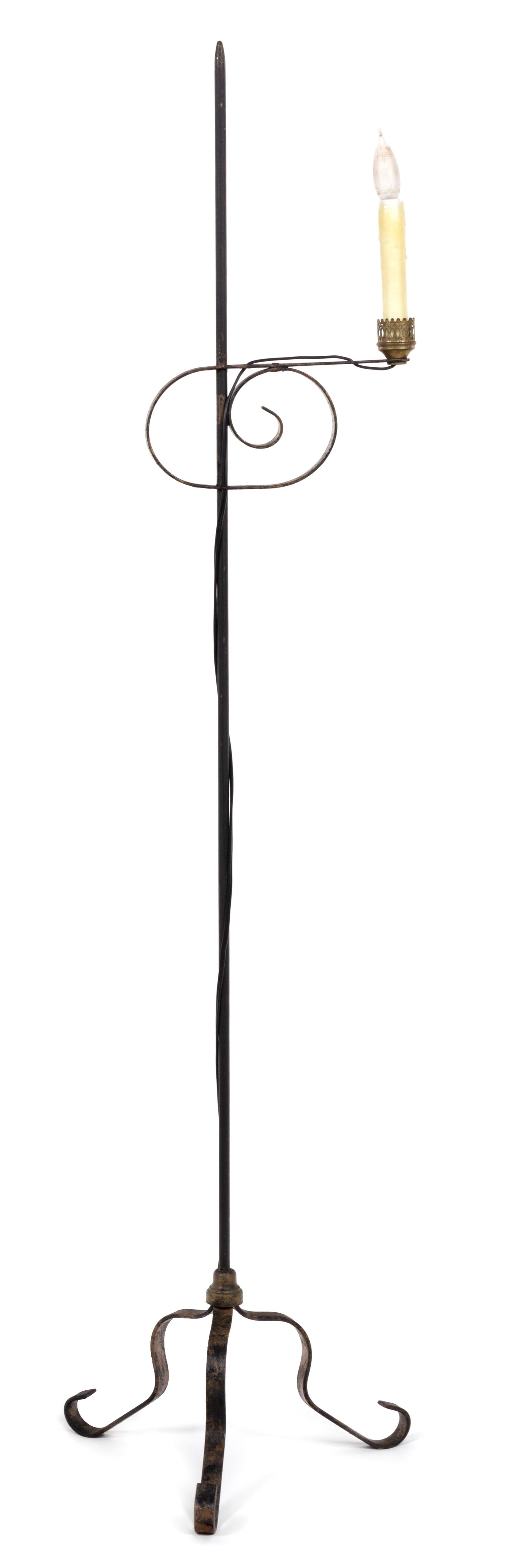 A Baroque Style Cast Iron Adjustable Standing Lamp Height 55 1/2 inches.