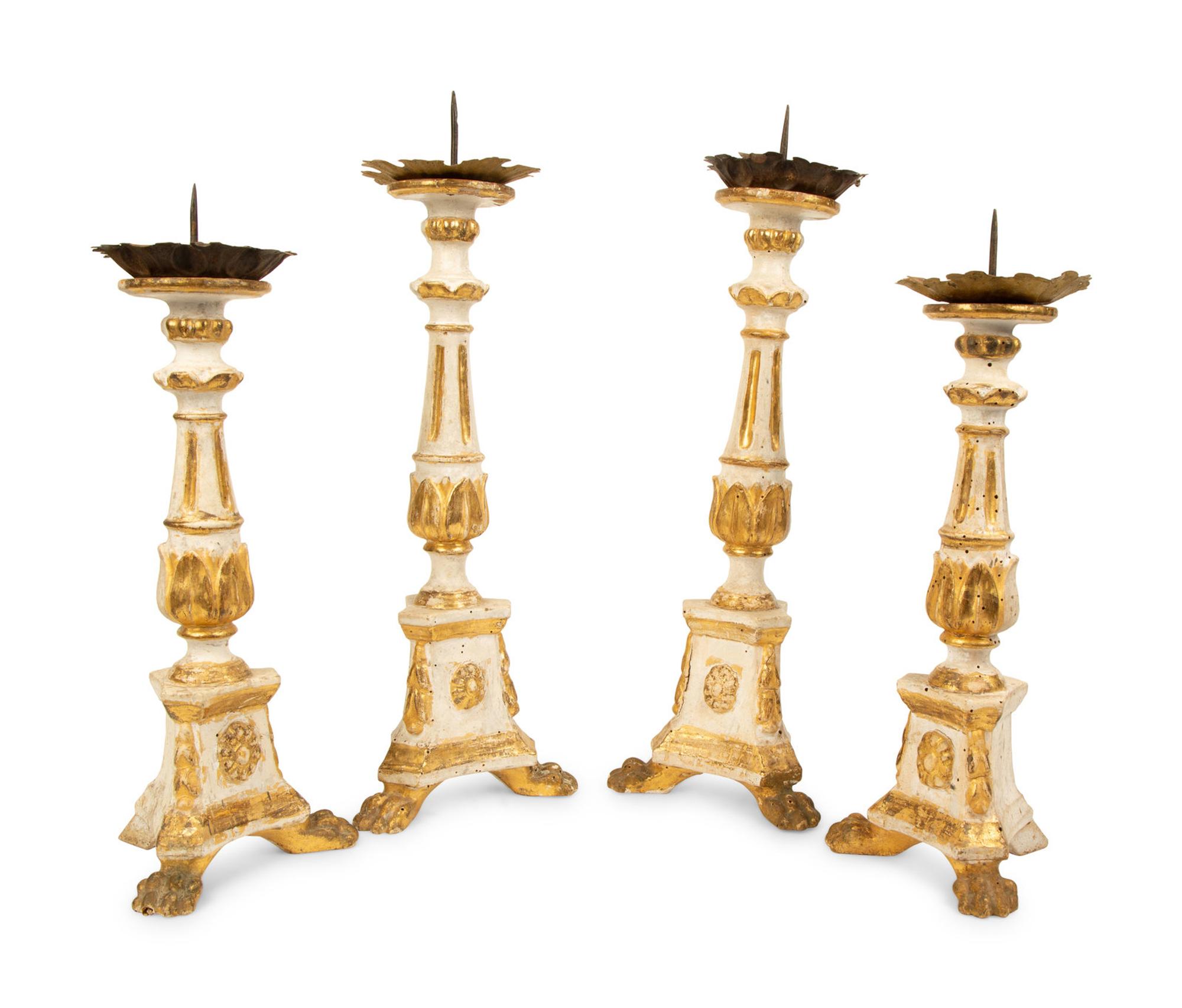 Two Pairs of Tuscan Painted and Parcel Gilt Candlesticks — 17TH CENTURY