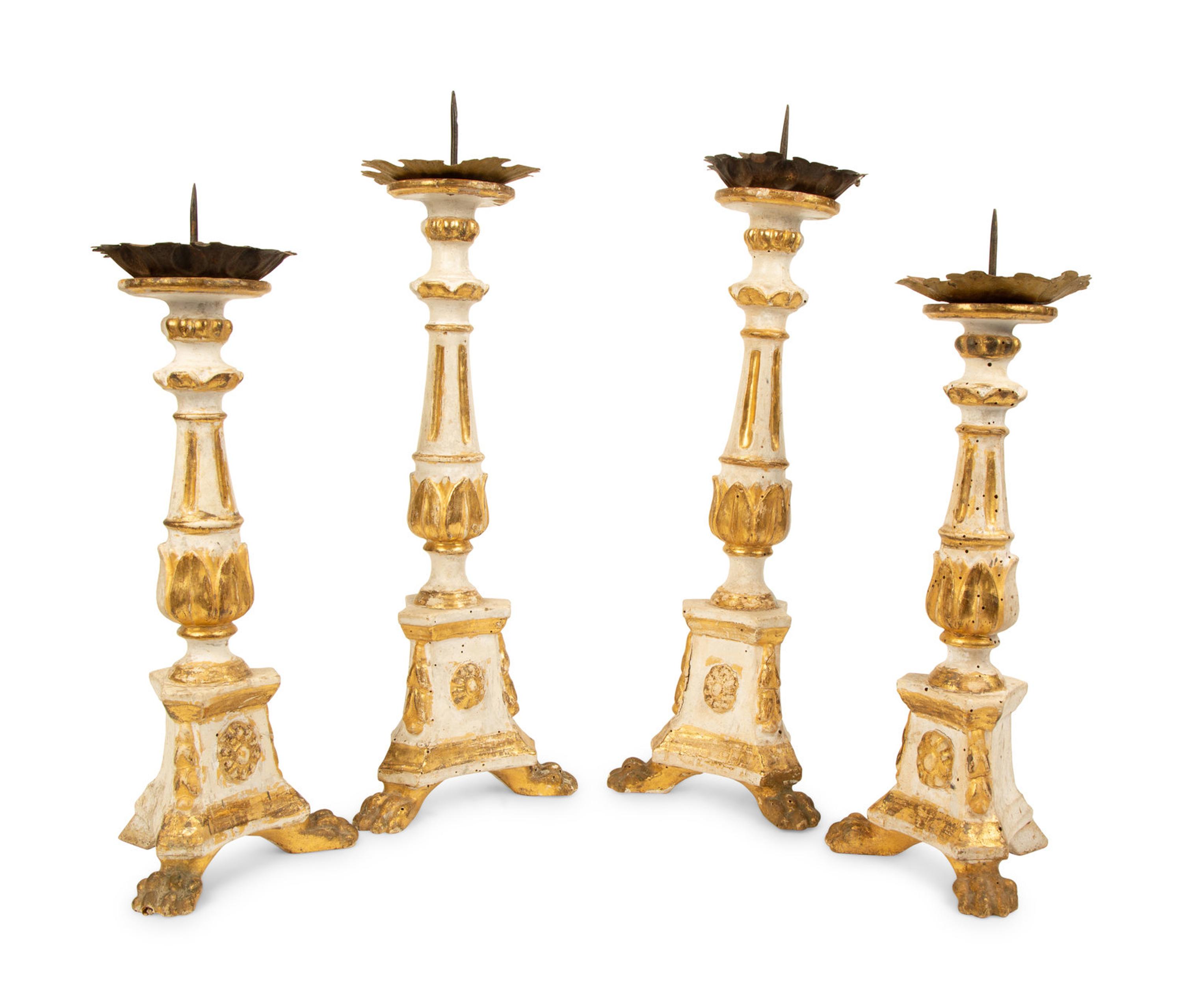 Two Pairs of Tuscan Painted and Parcel Gilt Candlesticks — 17TH CENTURY