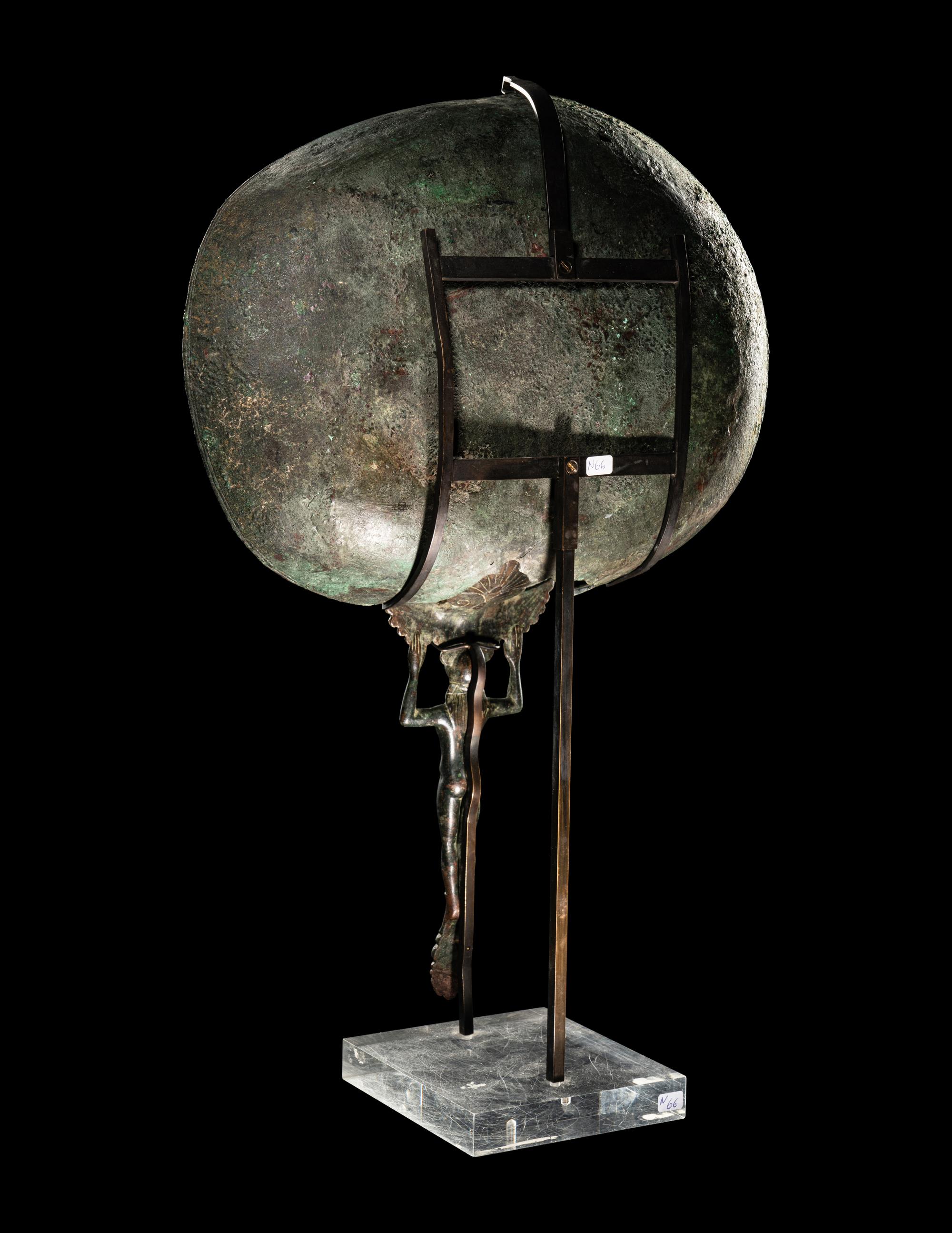 A Western Greek Bronze Patera with a Nude Youth as Handle