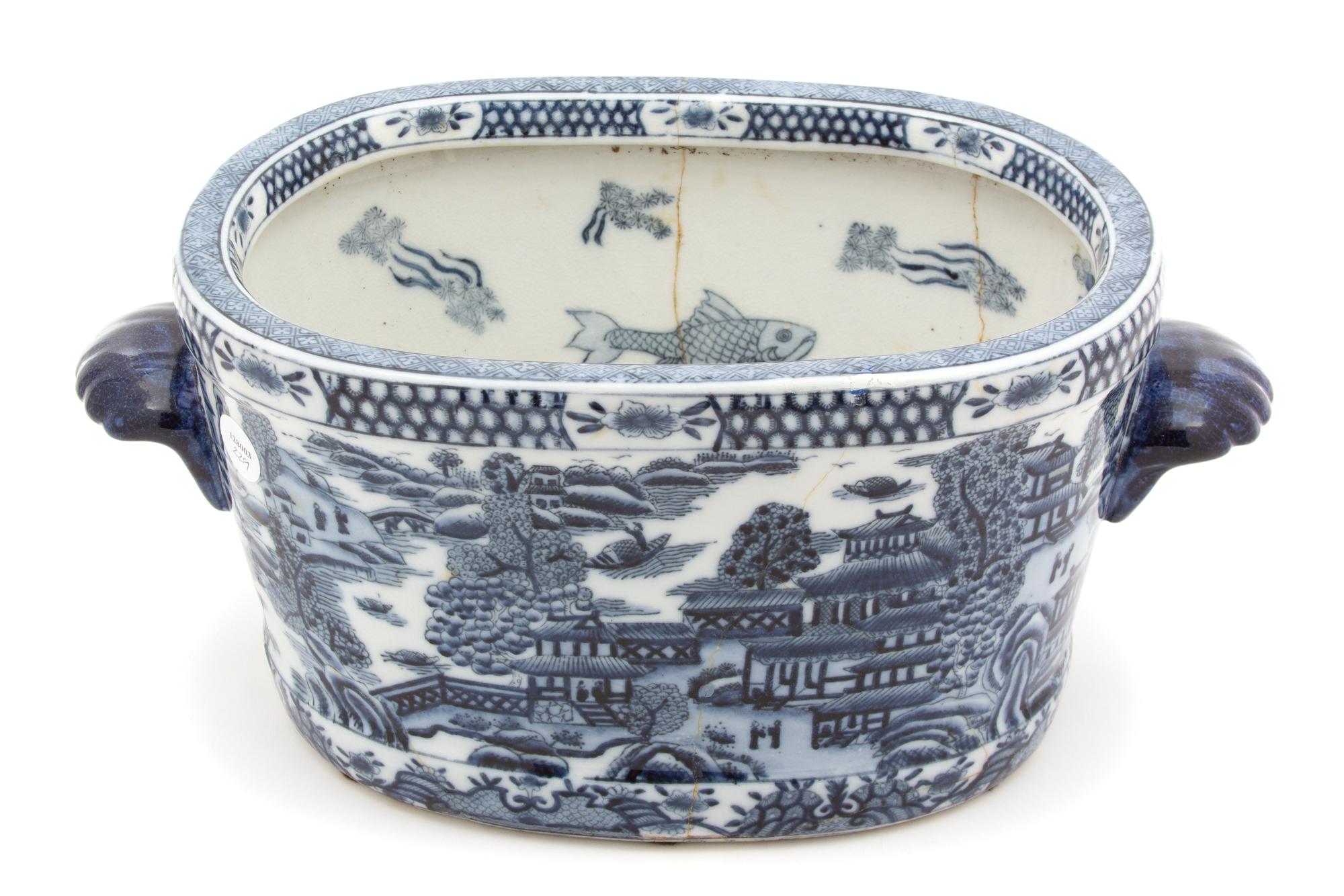 A Chinese Export Blue and White Porcelain Jardiniere Height 8 x length 18 inches. — 19TH CENTURY