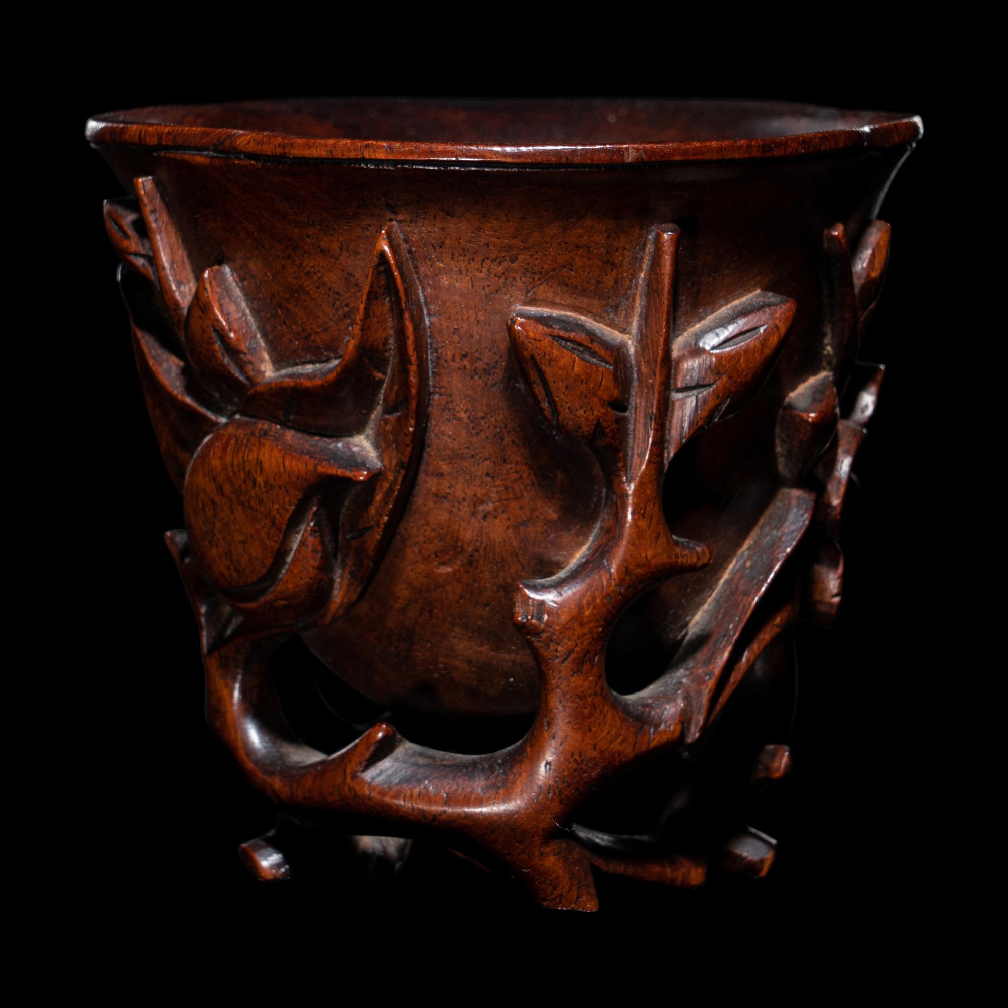 A Carved Huanghuali 'Peaches' Libation Cup