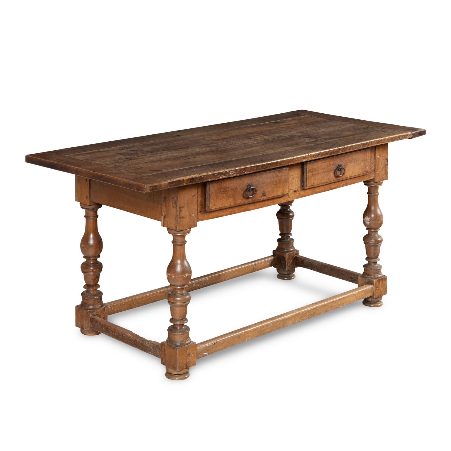A Continental Baroque Walnut Table