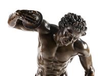 A Continental Patinated Bronze Figural Mantel Clock