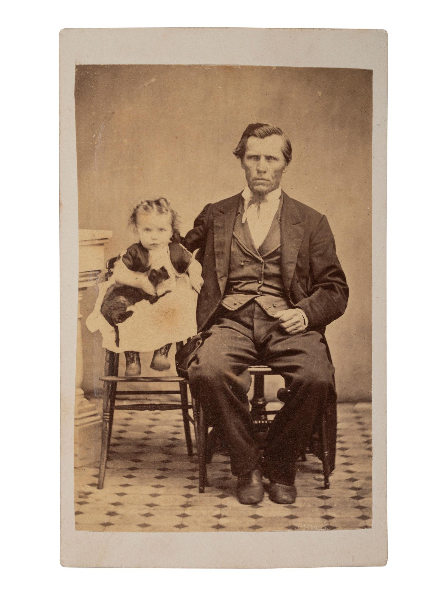 [EARLY PHOTOGRAPHY]. 6 CDVs of cats, including a portrait of a man with a feline perched on his shoulder by H. J. RODGERS, New Haven, CT.