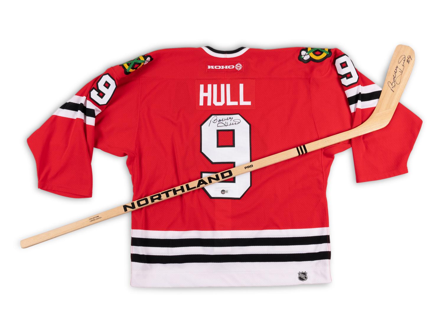 A Bobby Hull Signed Autograph Chicago Blackhawks Jersey and Hockey Stick (Beckett Authentication Services BAS Certfied),