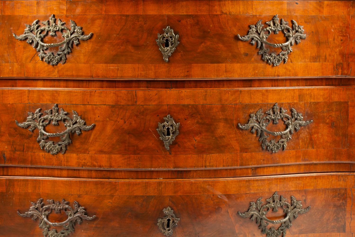 A Continental Walnut Commode