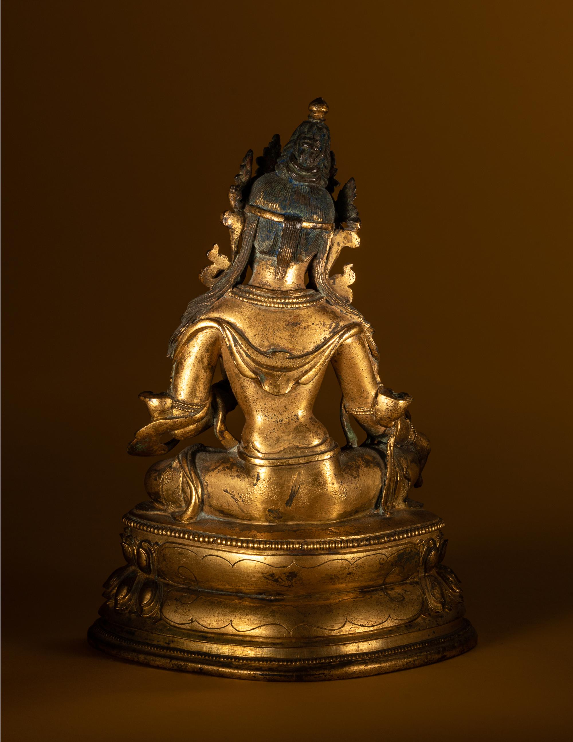 A Sino-Tibetan Gilt Bronze Figure of Seated Tara