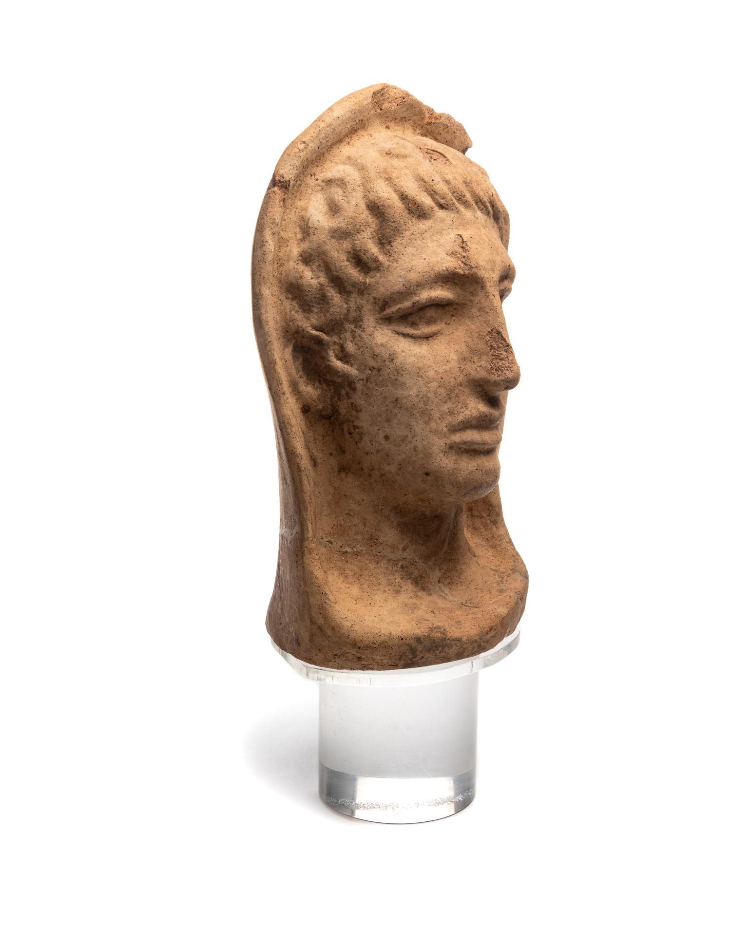 An Etruscan Terra Cotta Votive Head of a Man
