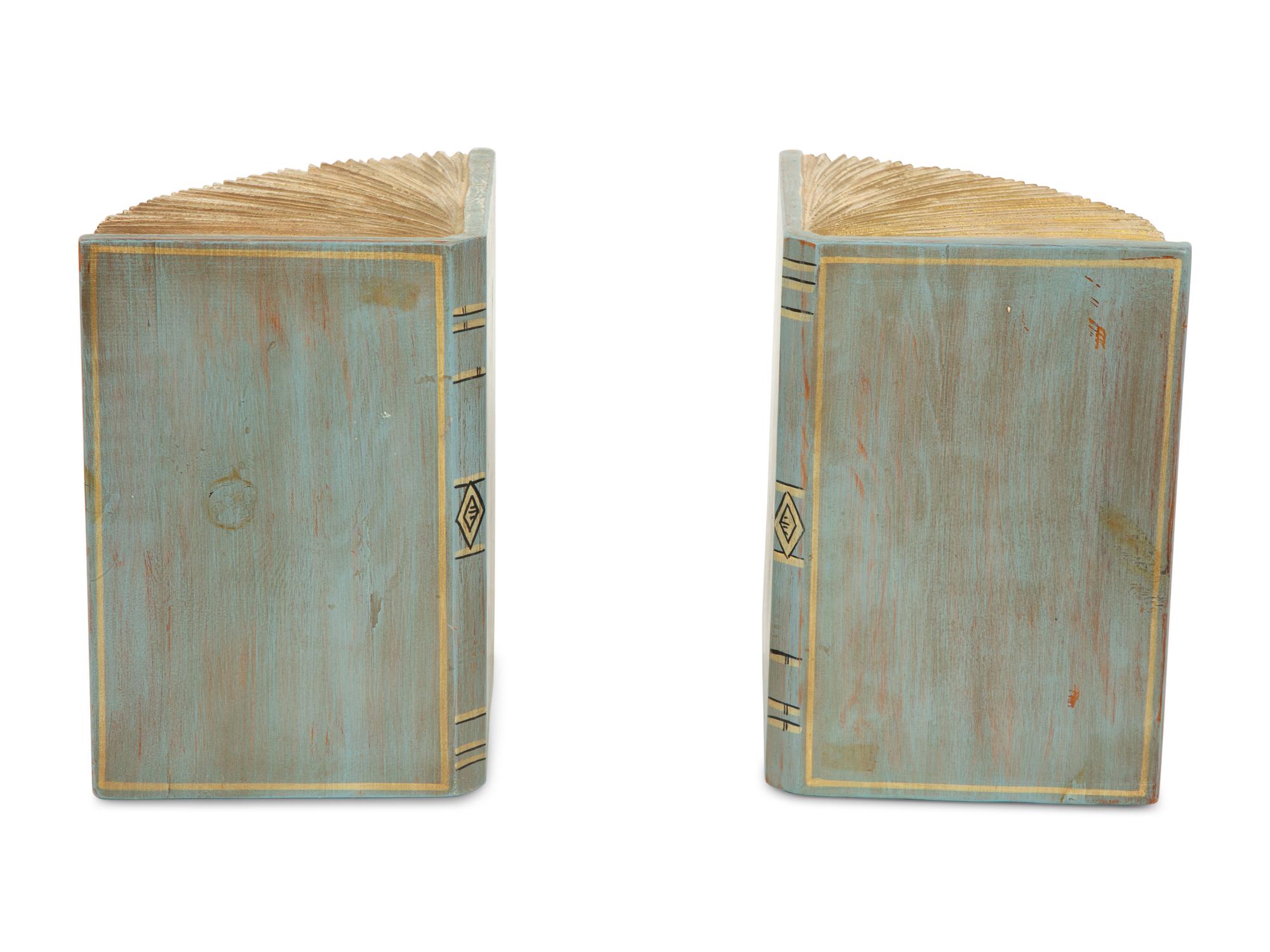 A Pair of Carved and Painted Parcel Gilt Models of Books
