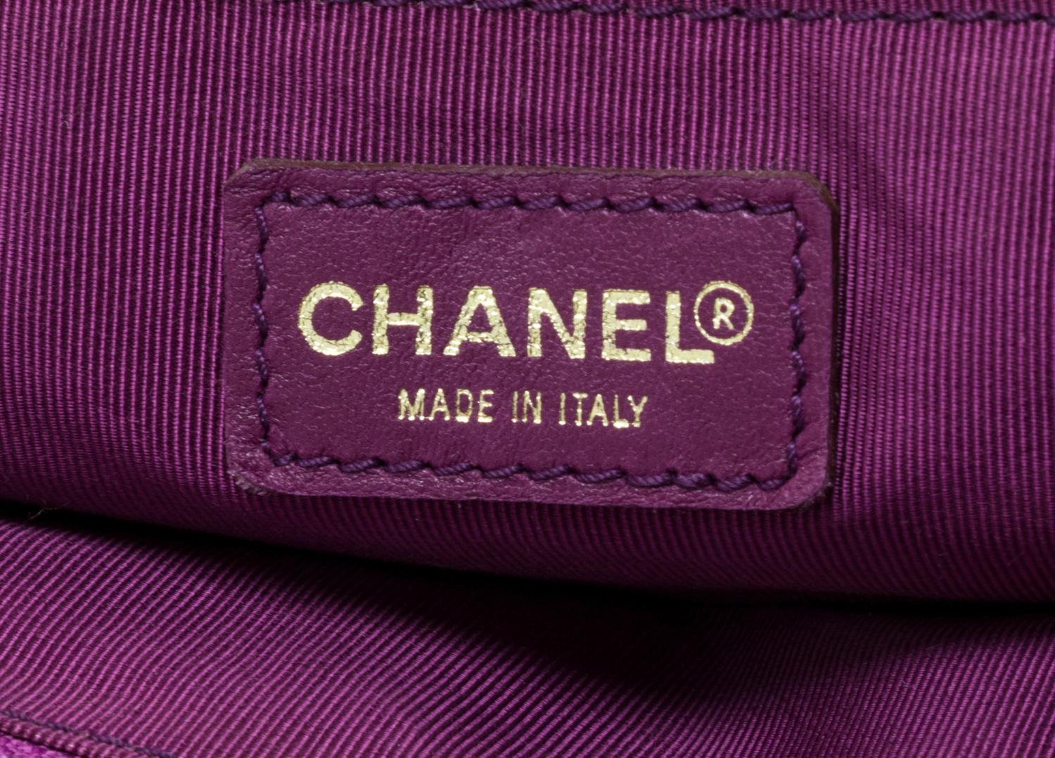 A Chanel Purple Quilted Caviar Leather Backpack, 12" x 10" x 3".