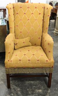 A George III Style Mahogany Wingback Chair. Height of chair 45 1/2 inches.