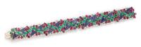A 14 Karat White Gold, Lapis Lazuli, Ruby, Emerald and Diamond Bracelet, 31.80 dwts.