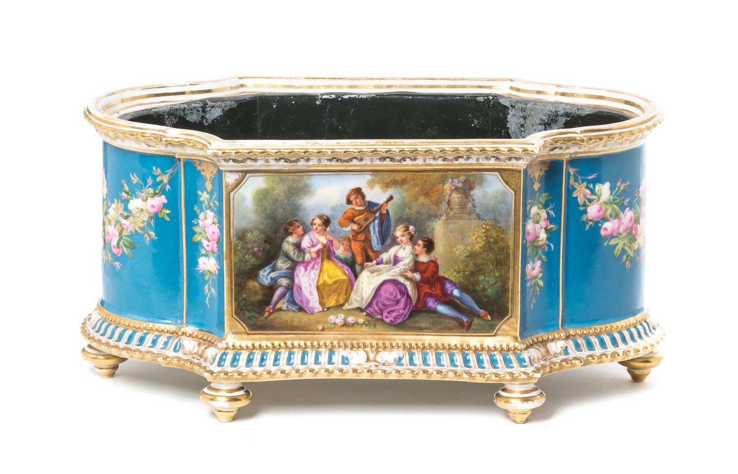 A Sevres Style Porcelain Jardiniere, Height 9 x width 18 inches.