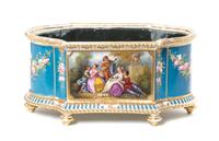 A Sevres Style Porcelain Jardiniere, Height 9 x width 18 inches.