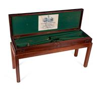 A George III Style Mahogany Gun Case on a Later Stand