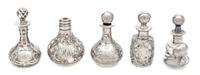 A Group of Five Silver Overlay Glass Perfume Bottles Height of tallest 3 1/2 inches.