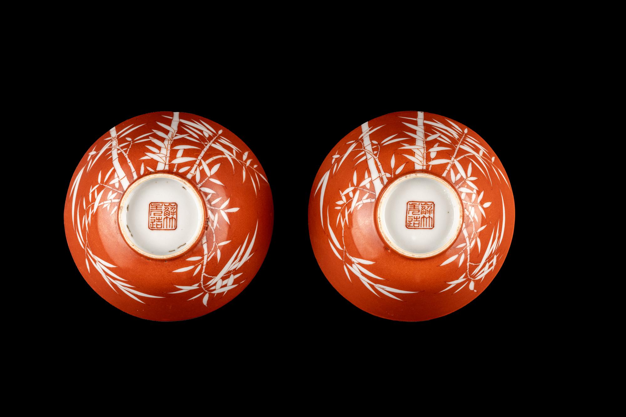 A Pair of Chinese Coral Red Ground Porcelain 'Bamboo' Tea Bowls