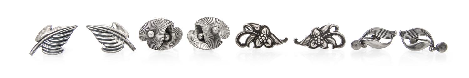 A Collection of Silver Earclips, 15.90 dwts.