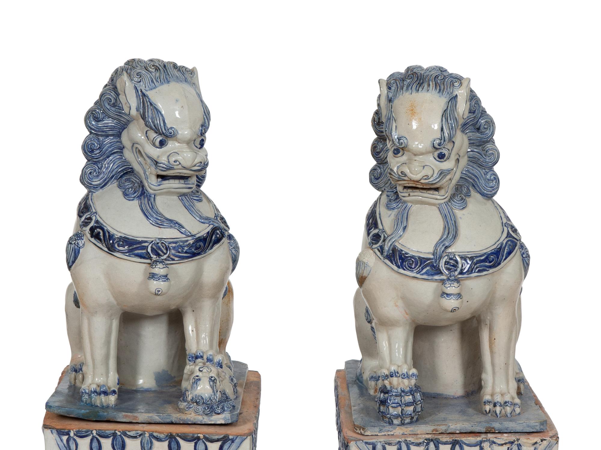 A Pair of Chinese Glazed Ceramic Guardian Lions