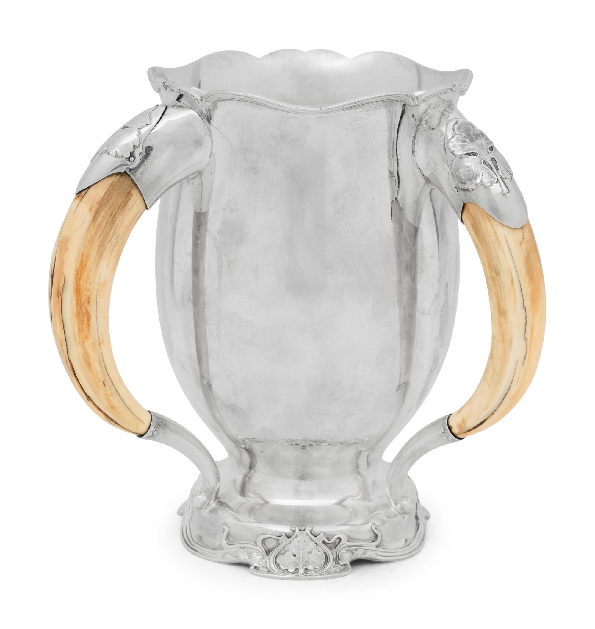 A Tiffany and Co. Silver and Horn Tyg