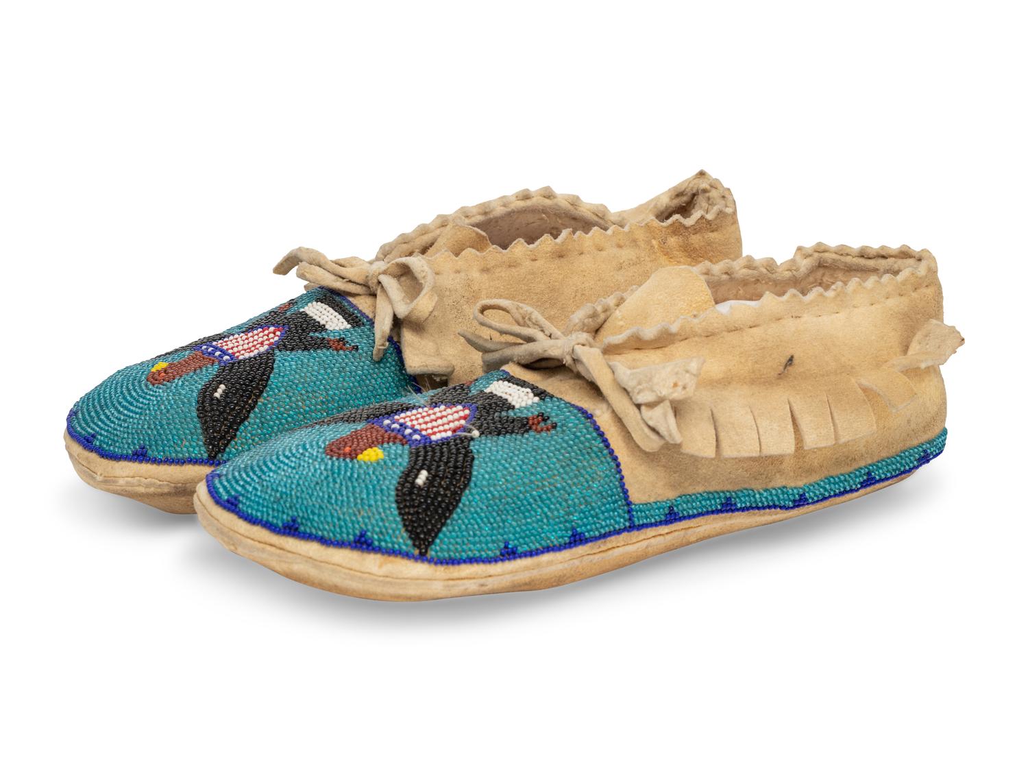 A Pair of Plateau Beaded Hide Moccasins