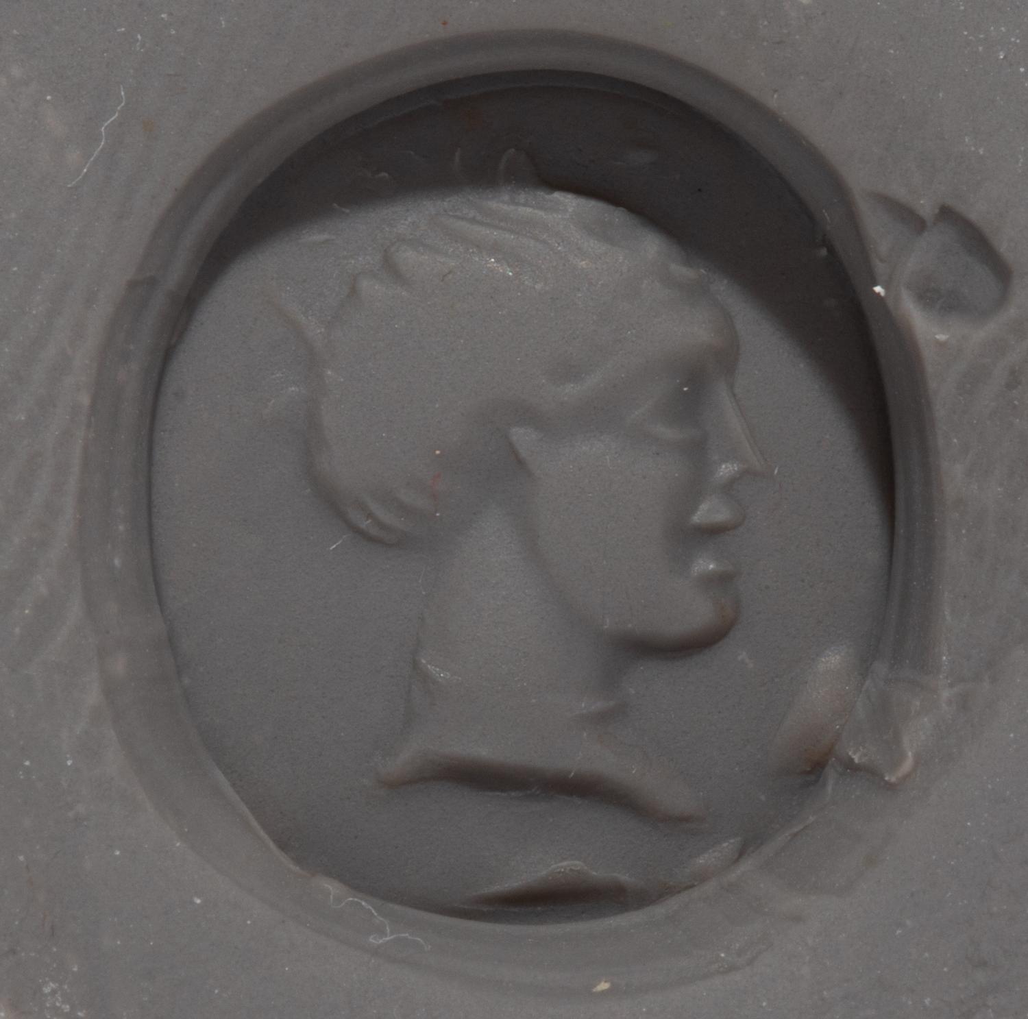A Roman Carnelian Ring Stone with a Female Portrait Head